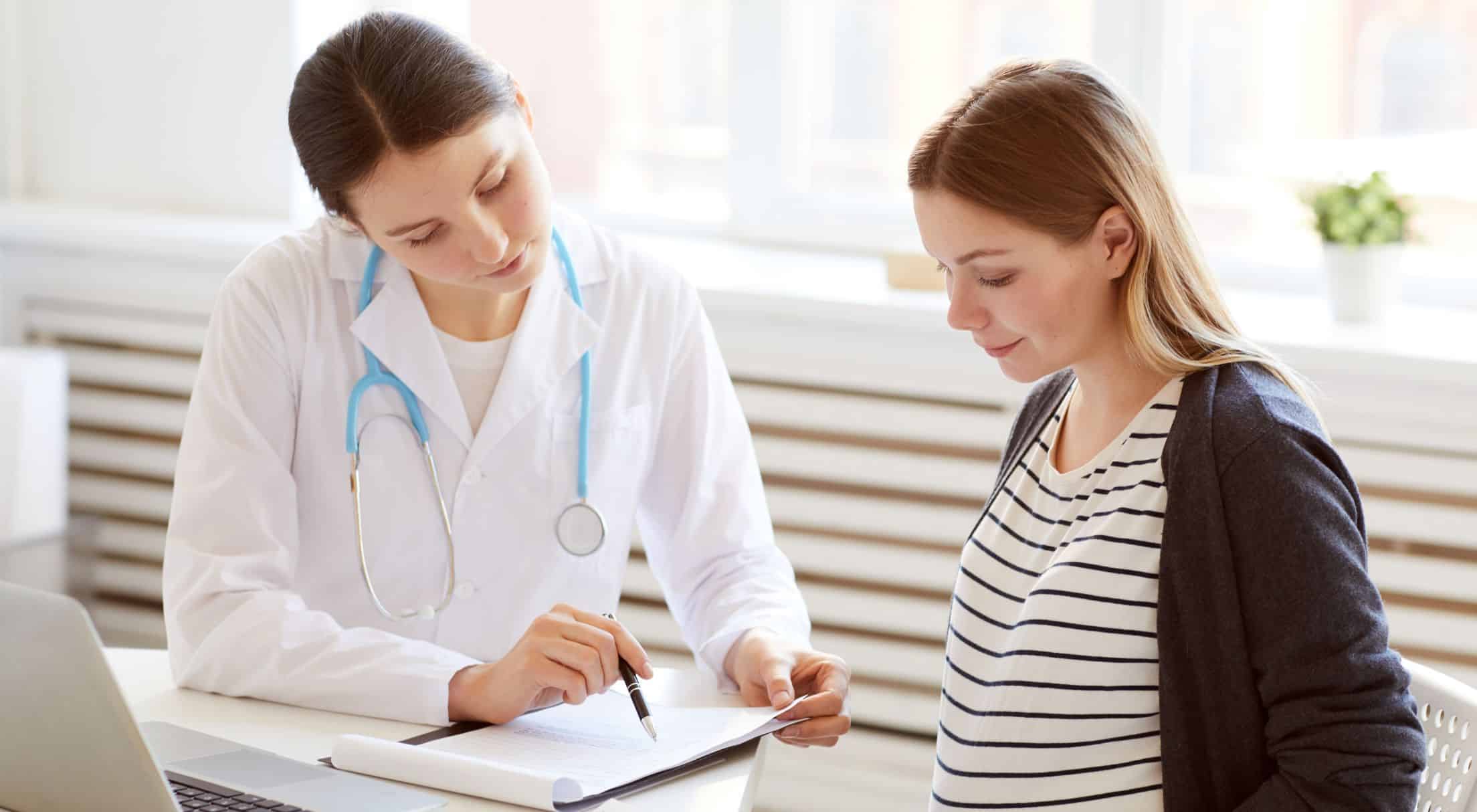 pregnant women visiting doctor